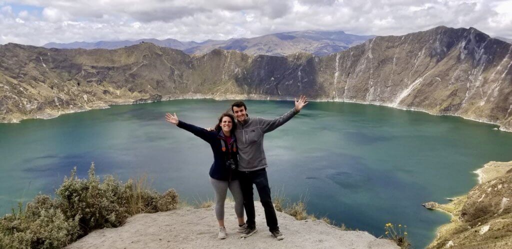 Standing in front of the Quilotoa Crater Lake in Ecuador, a gorgeous day hike down and back to the water's edge of a blue-green lagoon